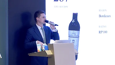 Auctioneer at Grand Cellar Auction during Singapore Wine Week at Resorts World Sentosa